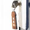 wooden keychain amsterdammertje with key in lock on webshop wooden amsterdam.jpg wooden keychain amsterdammertje with key in lock on webshop wooden amsterdam.jpg