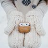 oakywood airpods 3 case oak oak 409 06 woman holding wooden AirPods case