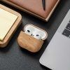 oakywood airpods 3 case oak oak 409 07 airpods case next to a laptop