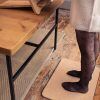 harmoni standing mat h005 03 woman standing up on a cork floor mat by brand Harmoni